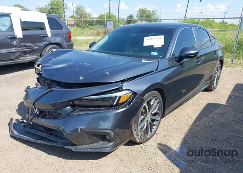 2024 Honda Civic Touring z USA, uszkodzony, nr VIN 2HGFE1F99RH302324